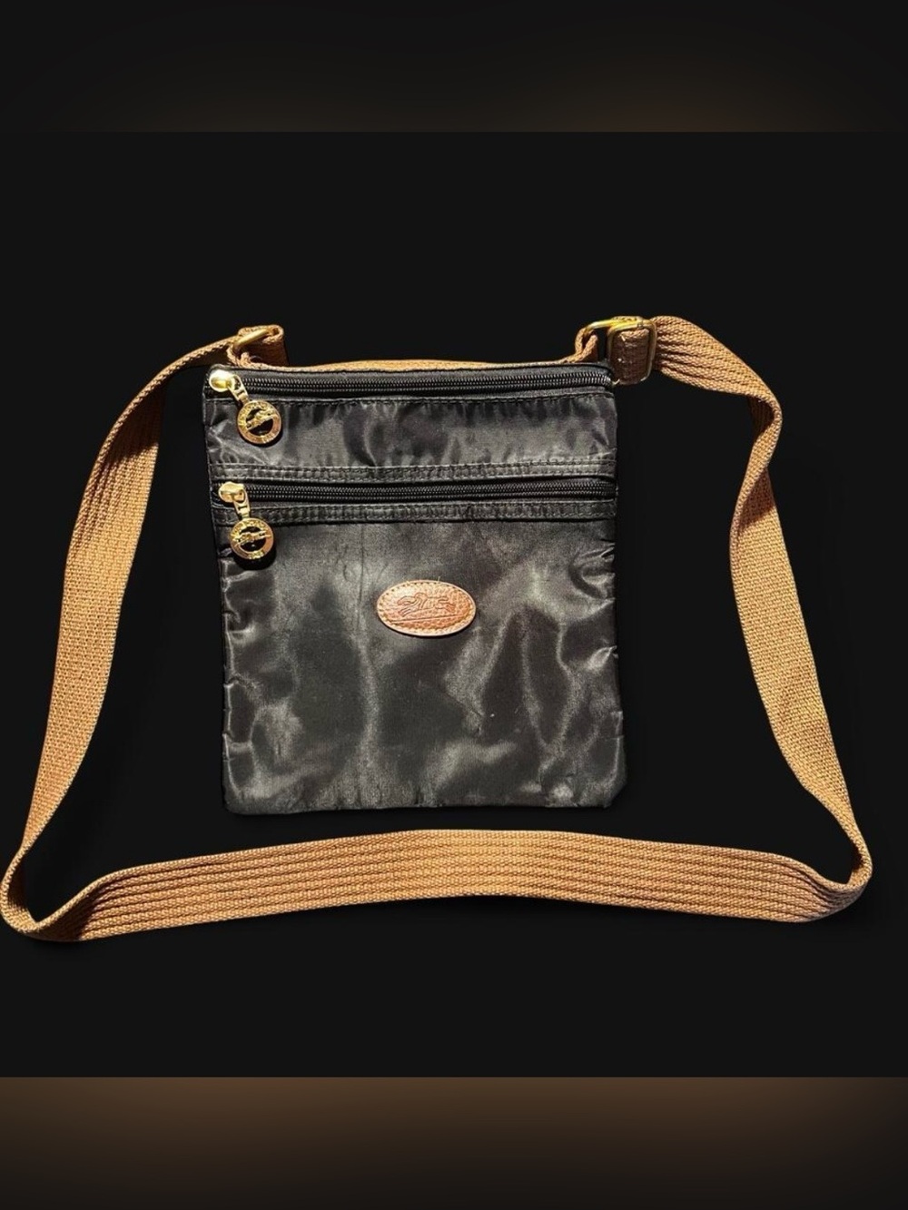 Vintage Longchamp Black Crossbody Bag with Tan Strap and Gold Accents
